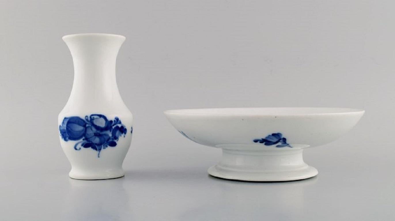 Jarrón y compota trenzados de flores azules de Royal Copenhagen.
El jarrón mide 14,7 x 8 cm.
La compota mide 21 x 6,8 cm.
En excelente estado.
Sellado.
2ª calidad de fábrica.