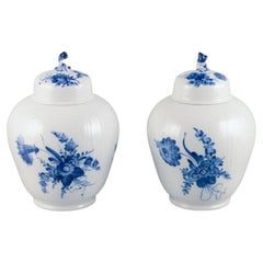 Royal Copenhagen Blue Flower Curved, a pair of lidded jars in porcelain