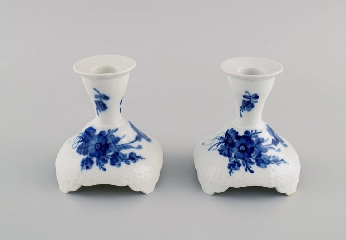Royal Copenhagen blue flower curved. A pair of low candlesticks. 
Model number 10/1711. Dated 1969-1974.
Measures: 10.3 x 9.5 cm.
In excellent condition.
Stamped.
1st factory quality.