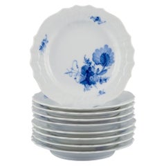 Royal Copenhagen Blue Flower Curved, set of nine plates.