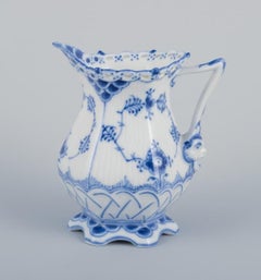 Royal Copenhagen Blue Fluted Full Lace creamer in porcelain.
