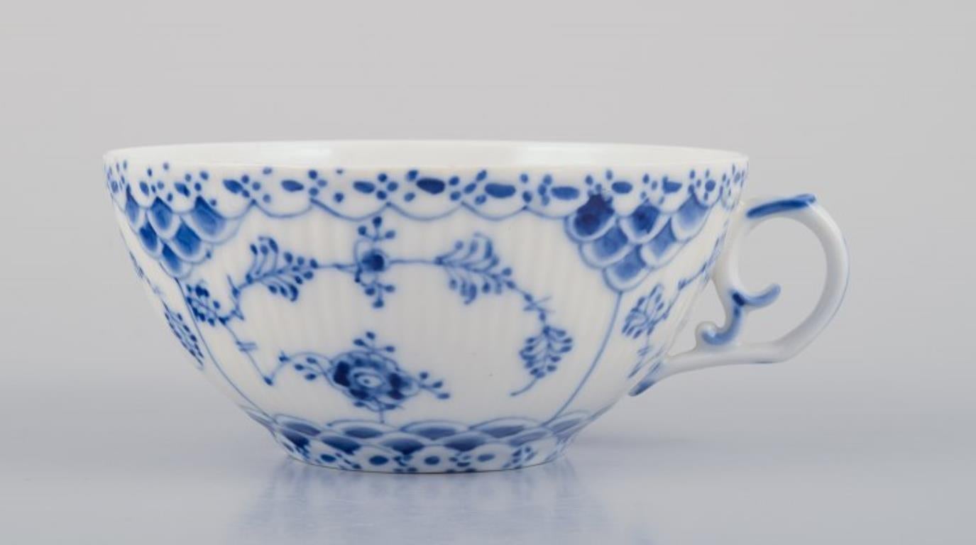 Hand-Painted Royal Copenhagen Blue Fluted Full Lace, four large tea cups with saucers.