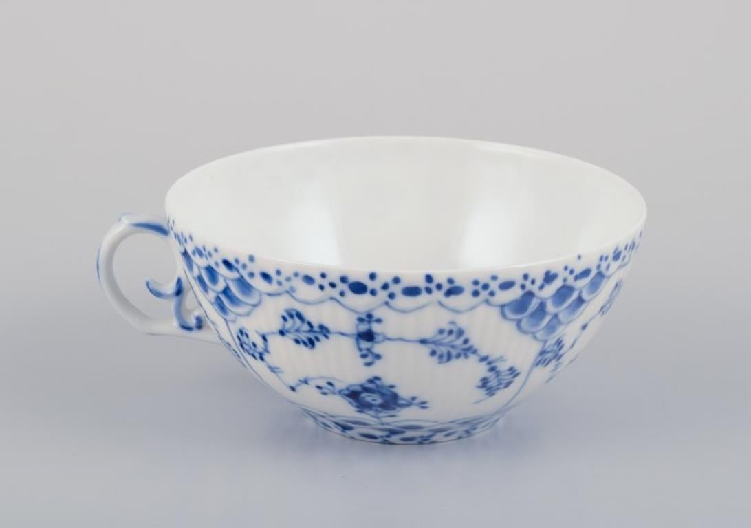 Mid-20th Century Royal Copenhagen Blue Fluted Full Lace, four large tea cups with saucers.