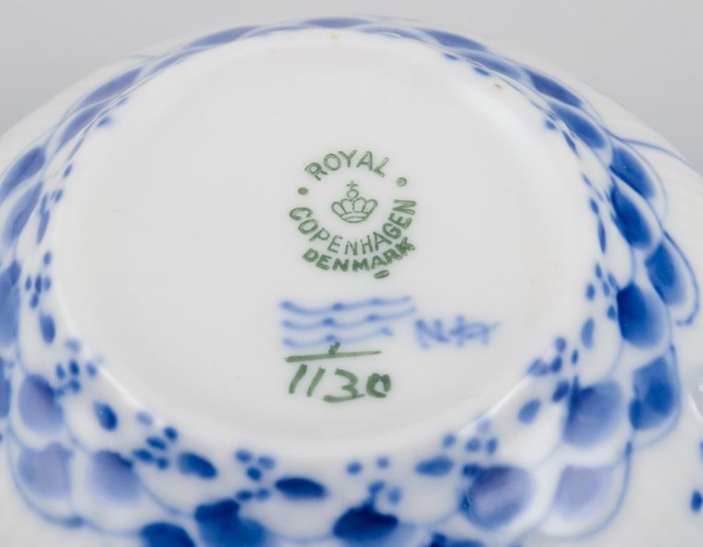 Porcelain Royal Copenhagen Blue Fluted Full Lace, four large tea cups with saucers.