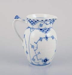 Royal Copenhagen Blue Fluted Half Lace, milk jug. Handle shaped like a snail.