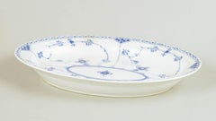 Royal Copenhagen. Blue Fluted Half Lace oval dish in porcelain, 1950