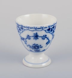 Royal Copenhagen Blue Fluted Half Lace, set of four egg cups in porcelain.
