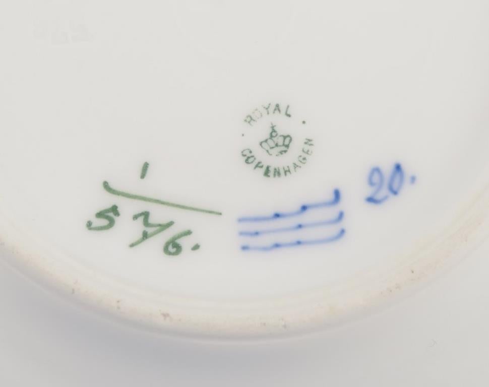 Porcelain Royal Copenhagen Blue Fluted Half Lace,  set of twelve plates.