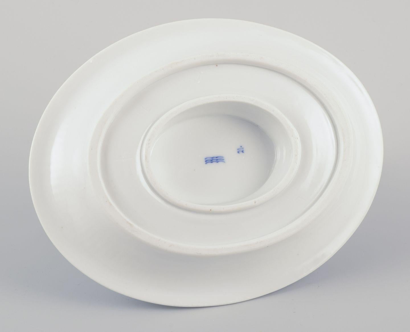 Porcelaine Royal Copenhagen Blue Fluted Plain. Saucière ancienne en porcelaine. en vente