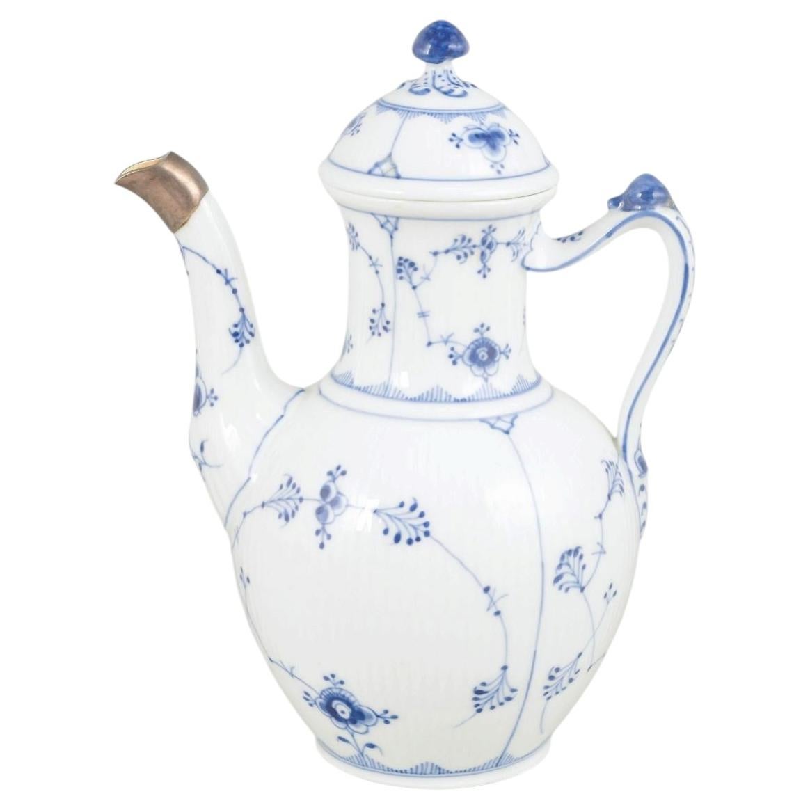 Royal Copenhagen. Blue Fluted Plain coffee pot with silver mount. Ca. 1920s. For Sale