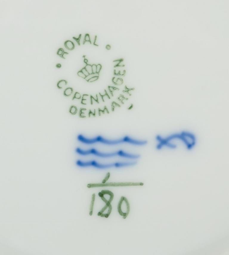 Mid-20th Century Royal Copenhagen Blue Fluted Plain. Eight plates in porcelain.