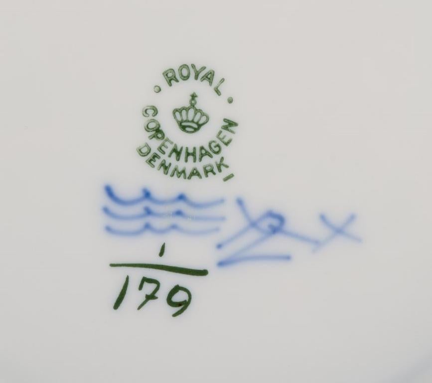 Hand-Painted Royal Copenhagen Blue Fluted Plain. Five plates in porcelain.