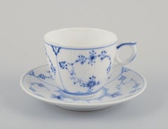 Royal Copenhagen Blue Fluted Plain. Four coffee cups with saucers in porcelain.