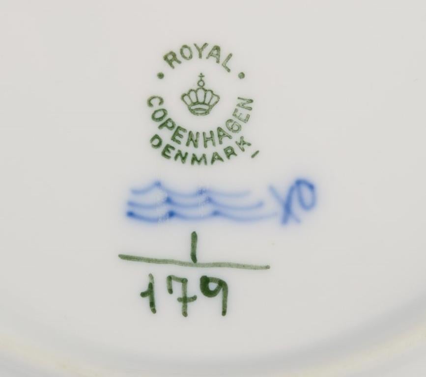 Royal Copenhagen Blau geriffelte Plain. Vier Teller aus Porzellan. 1