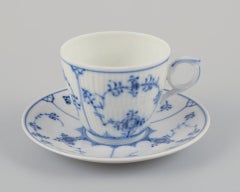 Royal Copenhagen Blue Fluted Plain. Four porcelain coffee cups with saucers.