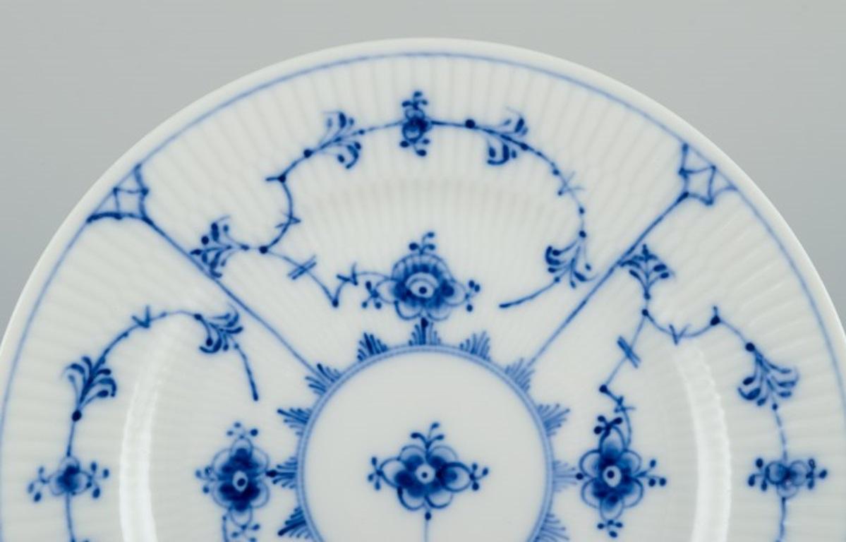 Hand-Painted Royal Copenhagen Blue Fluted Plain, nine dessert plates in porcelain