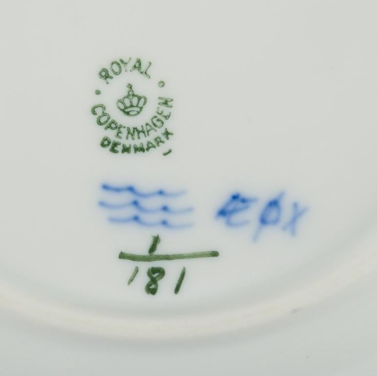 Mid-20th Century Royal Copenhagen Blue Fluted Plain, nine dessert plates in porcelain