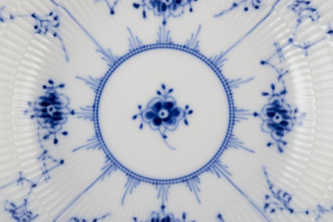 Glazed Royal Copenhagen Blue Fluted Plain. Set of five deep plates in porcelain. For Sale