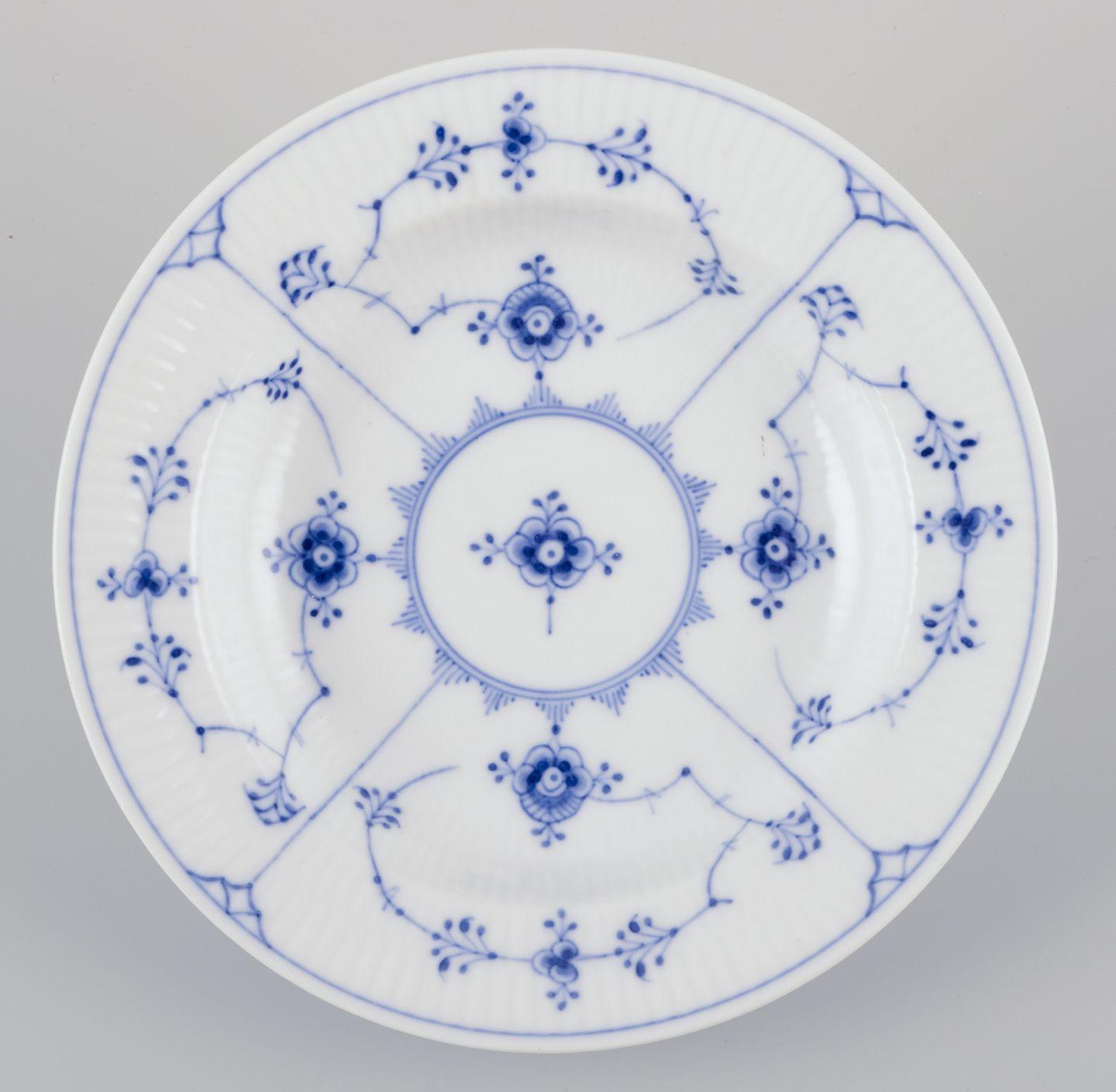 Early 20th Century Royal Copenhagen Blue Fluted Plain. Set of five small deep plates in porcelain. For Sale