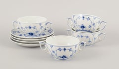 Royal Copenhagen Blue Fluted Plain. Set of four bouillon cups with saucers