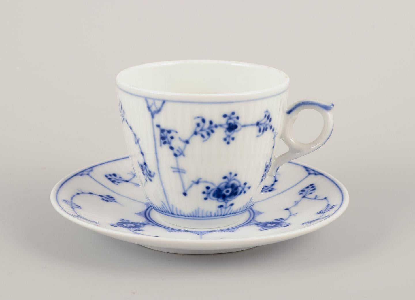 PRE-OWNED GOODS ARE EXEMPT FROM IMPORT TARIFFS FOR U.S., UK, AUSTRALIAN & CANADIAN CUSTOMERS.   
THEREFORE, NO IMPORT TARIFFS WILL BE APPLICABLE TO YOUR PURCHASE. 

Royal Copenhagen Blue Fluted Plain.
A set of four coffee cups with saucers in