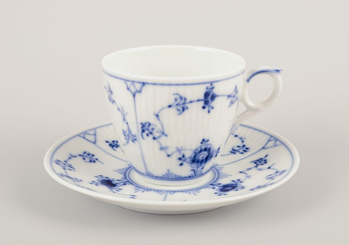 PRE-OWNED GOODS ARE EXEMPT FROM IMPORT TARIFFS FOR U.S., UK, AUSTRALIAN & CANADIAN CUSTOMERS.   
THEREFORE, NO IMPORT TARIFFS WILL BE APPLICABLE TO YOUR PURCHASE. 

Royal Copenhagen Blue Fluted Plain.
A set of four coffee cups with saucers. 
Model