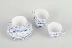 Royal Copenhagen, planche bleue cannelée. Ensemble de quatre tasses à café avec soucoupes
