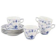 Royal Copenhagen Blue Fluted Plain. Set of four coffee cups with saucers.