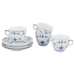 Royal Copenhagen, planche bleue cannelée. Ensemble de quatre tasses à café avec soucoupes