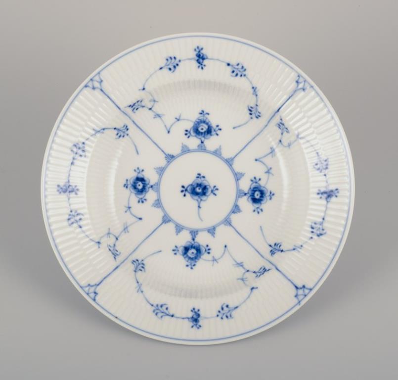 Royal Copenhagen Azul Liso Acanalado. Juego de cuatro platos hondos de porcelana. Danés