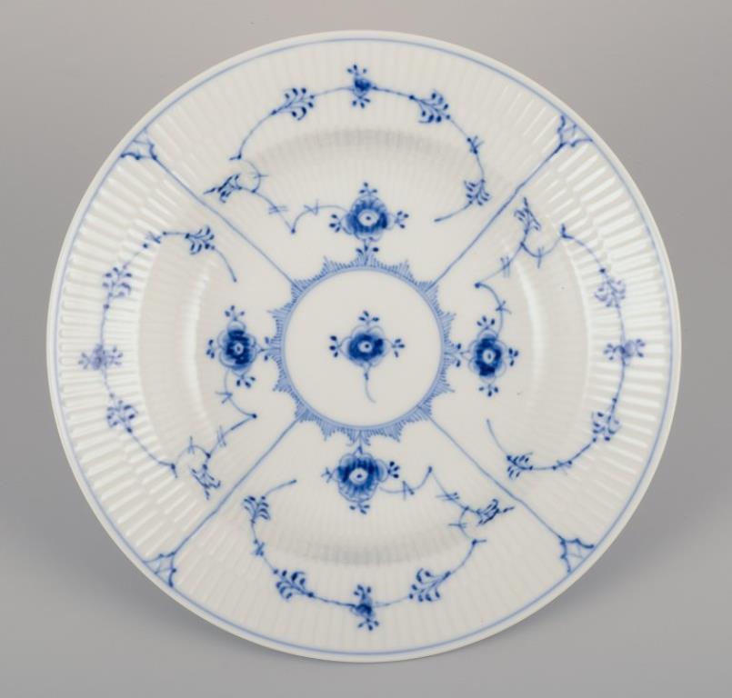 Royal Copenhagen Azul Liso Acanalado. Juego de cuatro platos hondos de porcelana. mediados del siglo XX