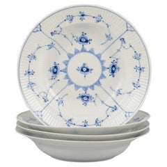Royal Copenhagen Blue Fluted Plain. Set di quattro piatti fondi in porcellana.