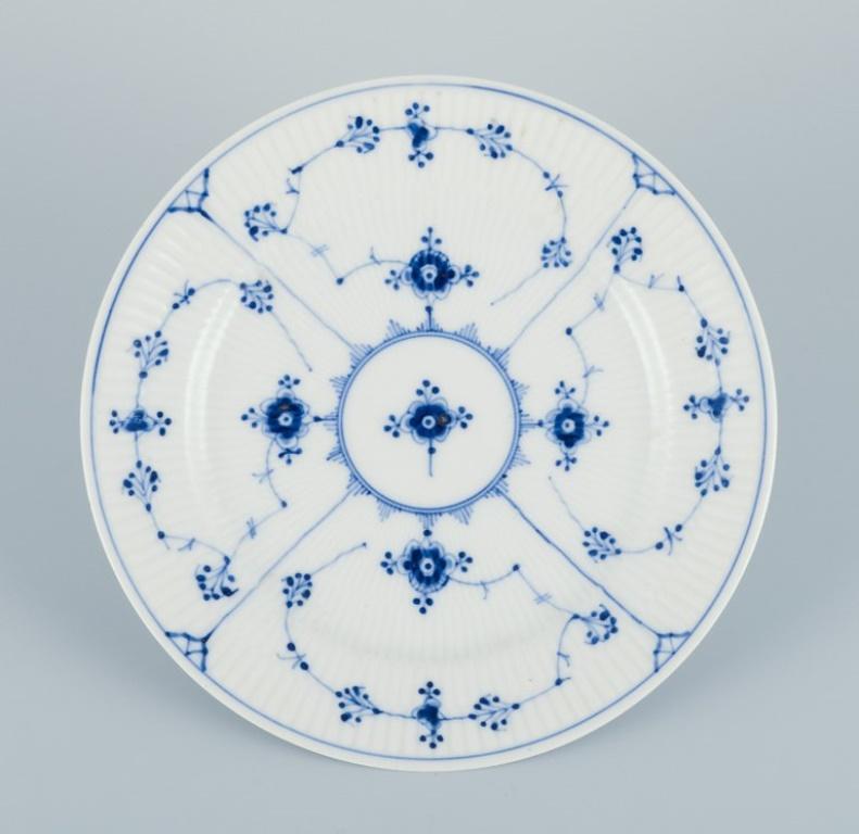 Royal Copenhagen, Blue Fluted Plain. A set of four plates.
From the 1920s to 1930s.
Model 1/299.
One plate in first factory quality. Three plates in second factory quality.
Perfect condition.
Marked.
Dimensions: Diameter 18.8 cm.