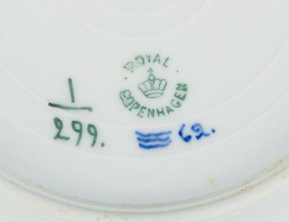 Porcelain Royal Copenhagen, Blue Fluted Plain. Set of four plates. 1920s/30s For Sale
