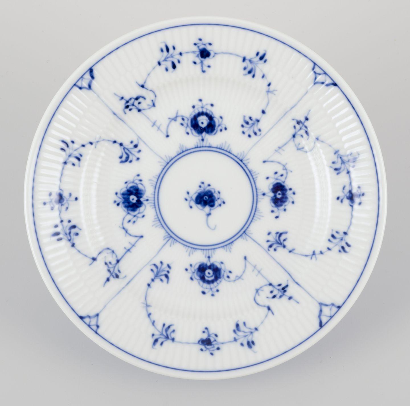 Glazed Royal Copenhagen Blue Fluted Plain. Set of four salad plates in porcelain. For Sale