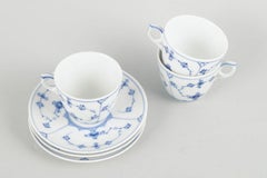 Royal Copenhagen Blue Fluted Plain. Three coffee cups with saucers. Early 20th C