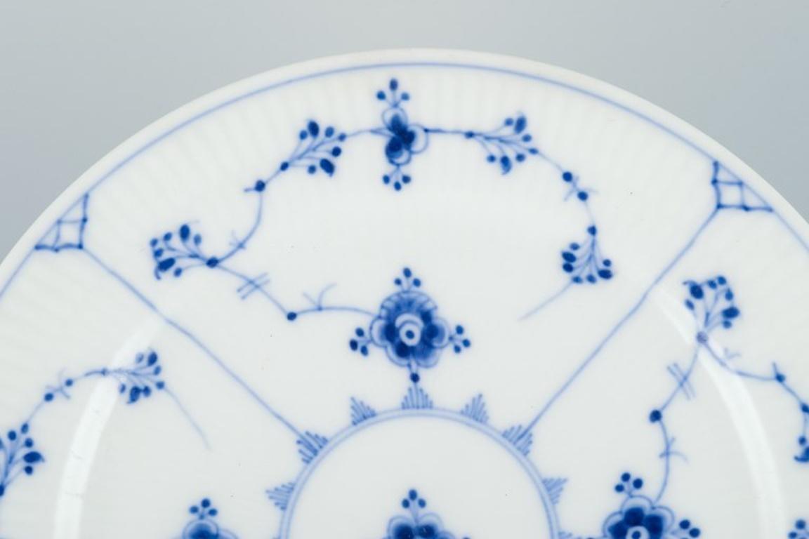 Hand-Painted Royal Copenhagen, Blue Fluted Plain. Three dinner plates. Early 1900s. 