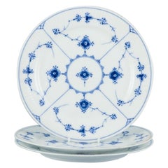 Royal Copenhagen, Blue Fluted Plain. Three dinner plates. Early 1900s.