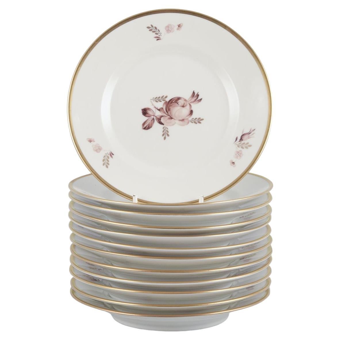 Royal Copenhagen Brown Rose. Set of twelve cake plates in porcelain. in vendita