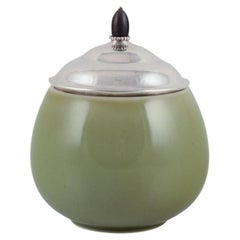 Retro Royal Copenhagen ceramic jar. Silver lid with ebony knob. Celadon glaze.