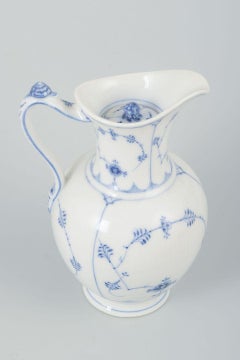 Royal Copenhagen. Chocolate jug in porcelain. Blue Fluted pattern, ca. 1890s.