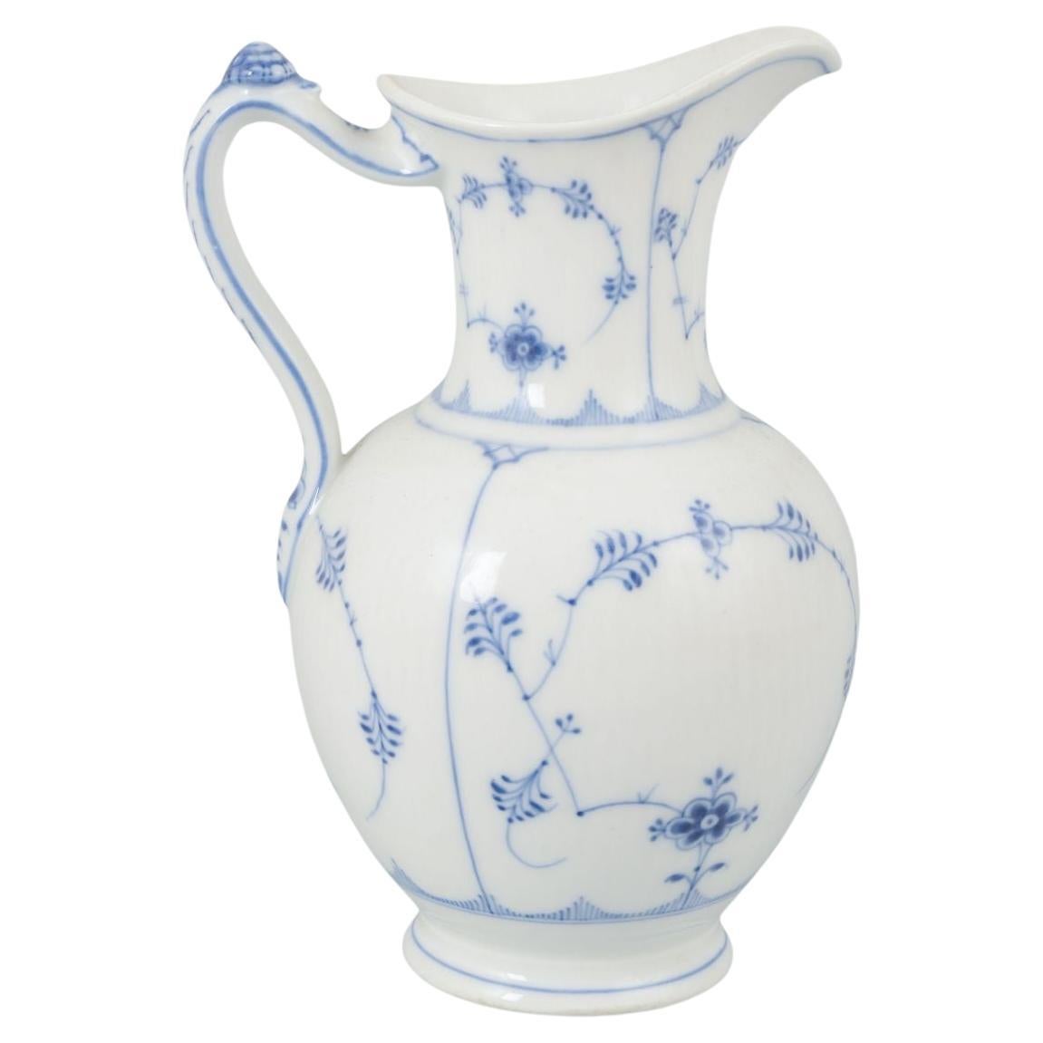 Royal Copenhagen. Chocolate jug in porcelain. Blue Fluted pattern, ca. 1890s. For Sale