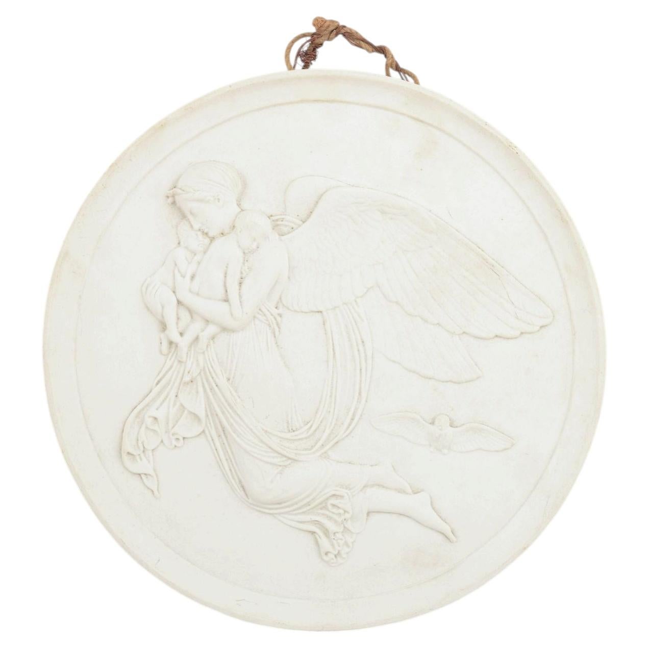 Royal Copenhagen. Circular wall plaque in biscuit, after B. Thorvaldsen, 1870s.