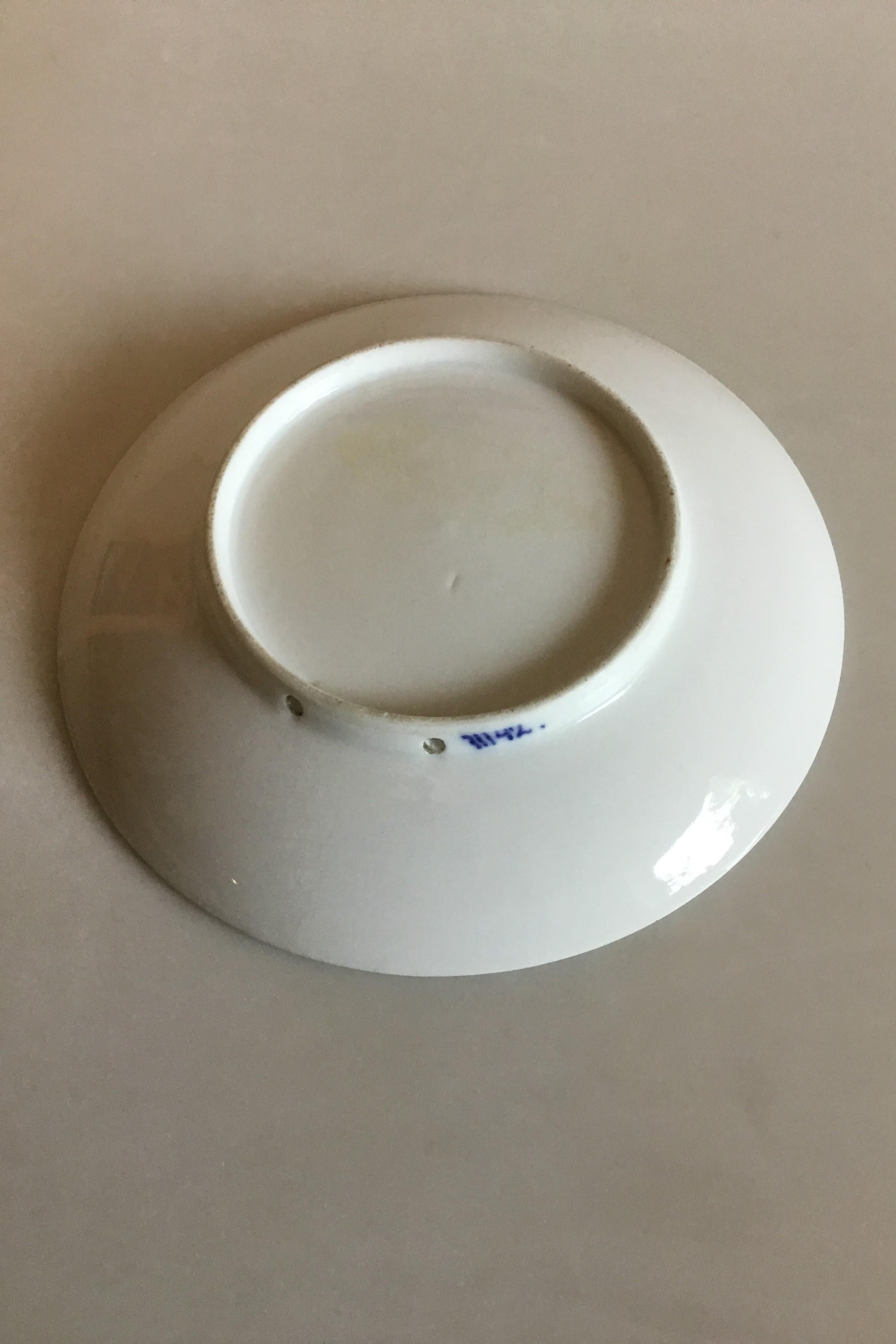 Royal Copenhagen commemorative plate from 1928 RC-CM255. Measures: 17 cm / 6 11/16 in. and is in good condition.