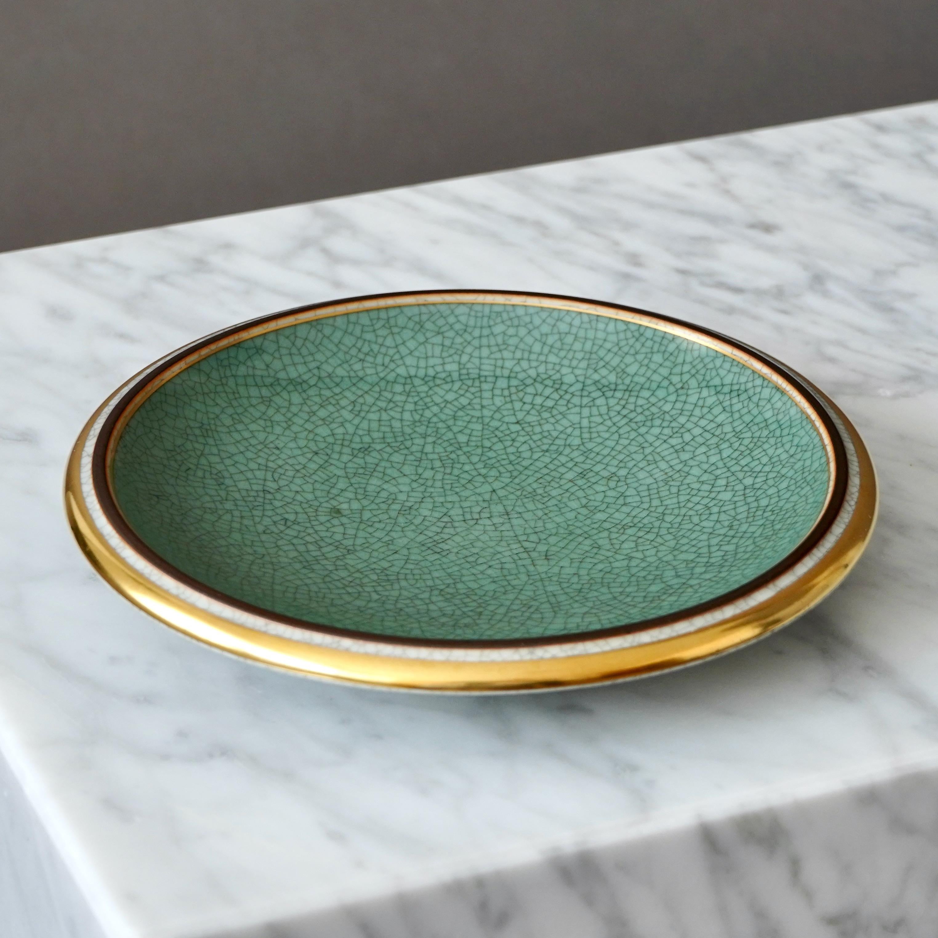 Royal Copenhagen Crackle glasierte Schale. Thorkild Olsen, Dänemark, 1958. Grünes Gold. (Dänisch) im Angebot
