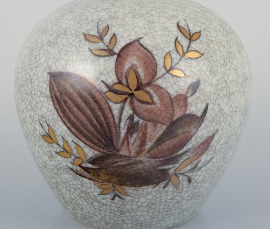 Mid-20th Century Royal Copenhagen, crackled porcelain vase with floral motif and gold decoration. For Sale