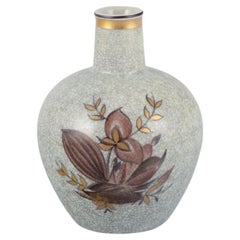 Royal Copenhagen, crackled porcelain vase with floral motif and gold decoration.