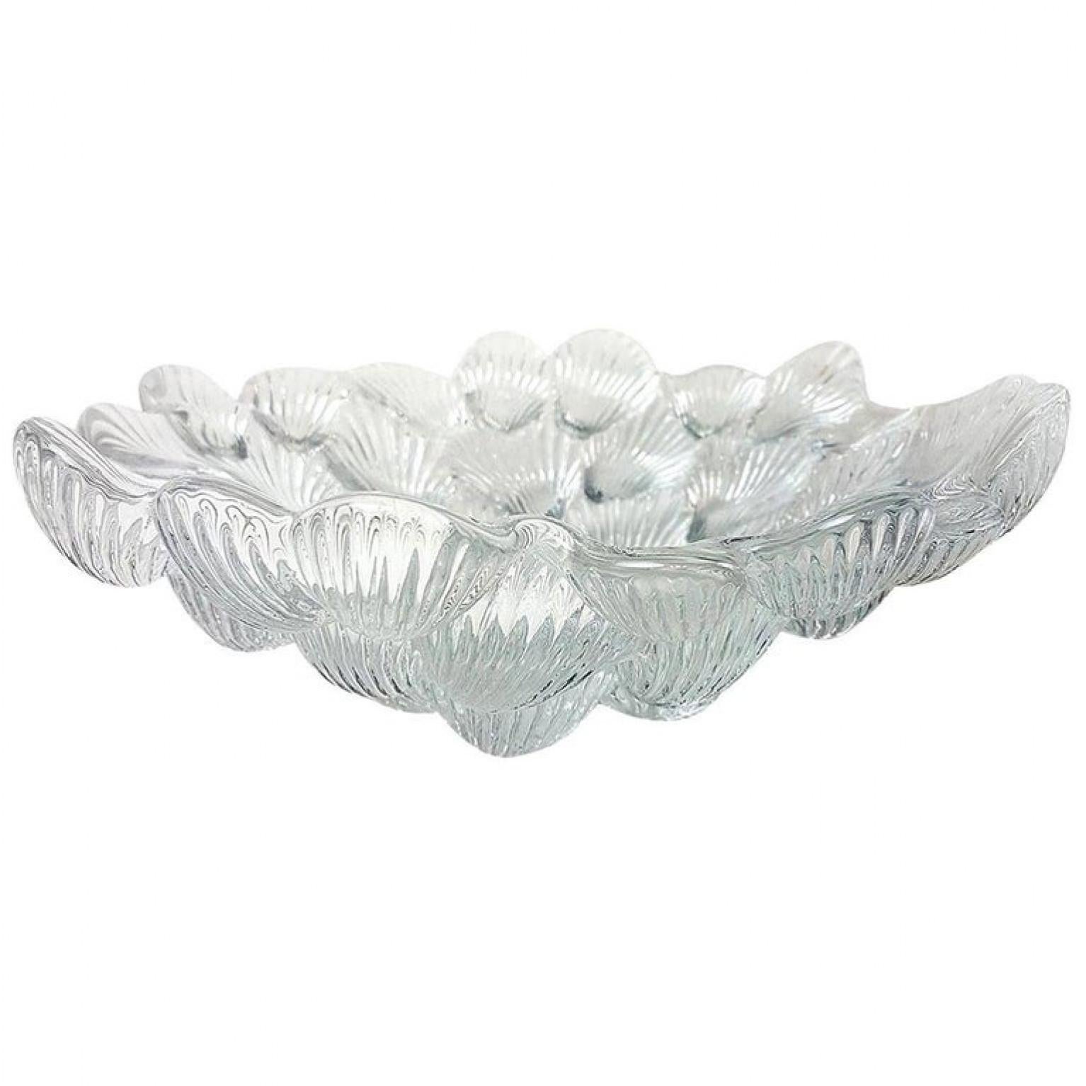 Royal Copenhagen crystal relief molded musling shell bowl.
Designed by Per Lutkin a high-end piece of the late 20th century.
The heavy bowl composed of high relief shells. With an irregular rim.

In very good condition with no chips, cracks or