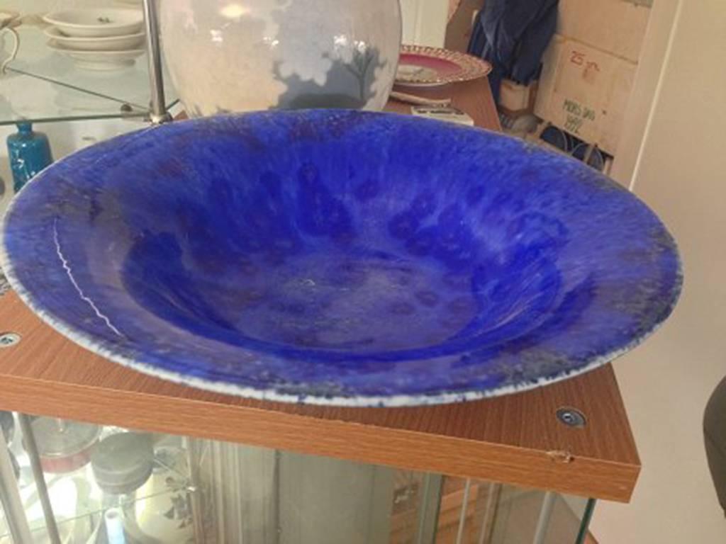Royal Copenhagen crystalline glaze bowl by Søren Berg from 1926. Measures 34.5 cm diameter and 9 cm high. Is in perfect condition.