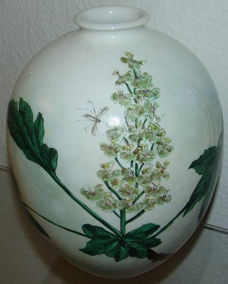 Royal Copenhagen crystalline glaze vase by Søren Berg from 1925. Measures 25 cm and is in good condition.